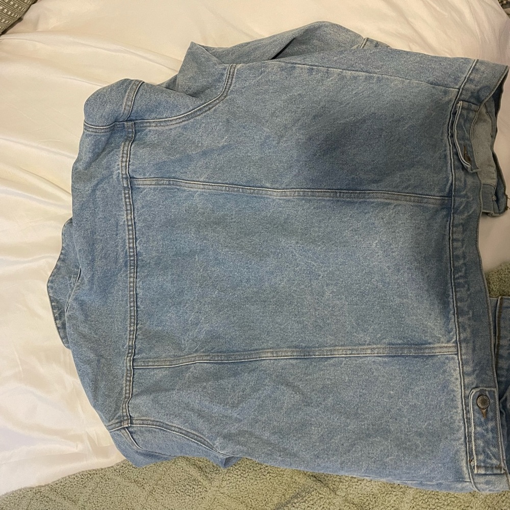 (Unsure of brand) barely worn blue jean jacket. Oversized. In perfect condition